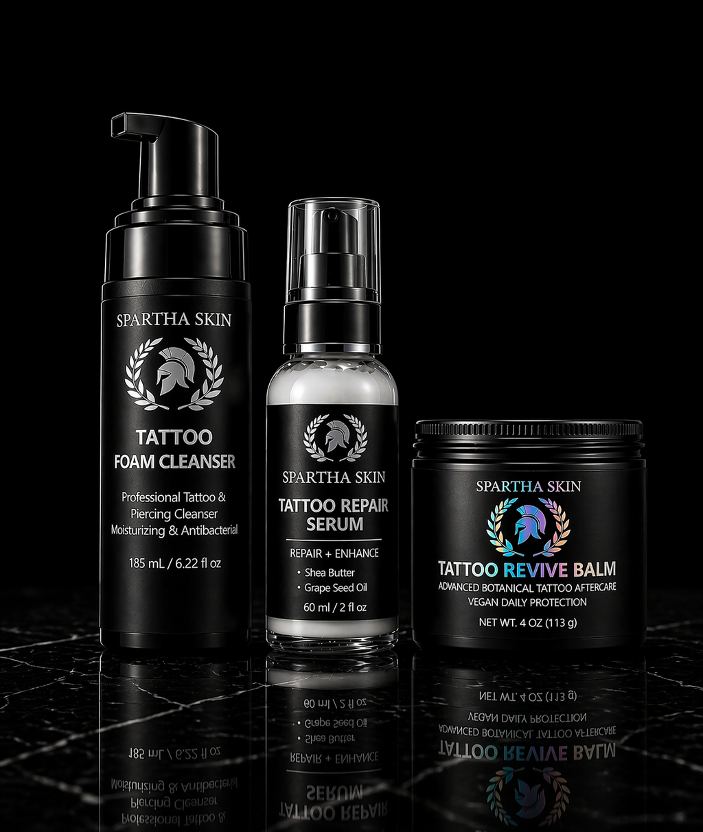 Spartha Skin tattoo aftercare bundle with cleanser, serum and balm on black background